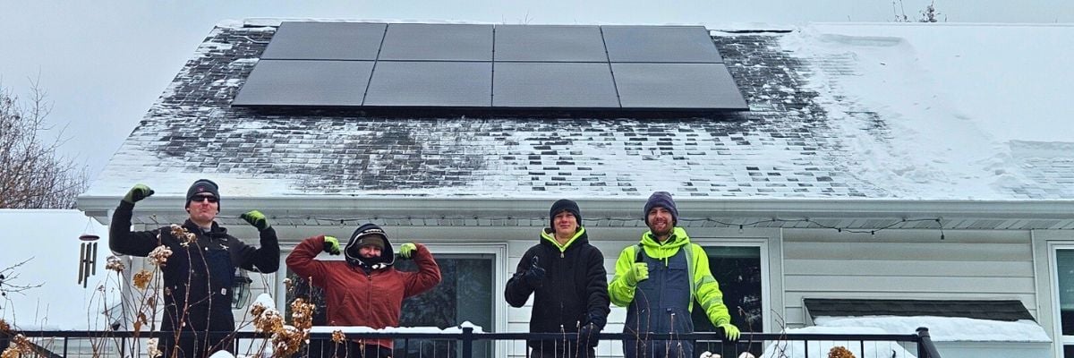 Northwind Solar Crew Pose in front of a recently completed roofmount solar electric system.